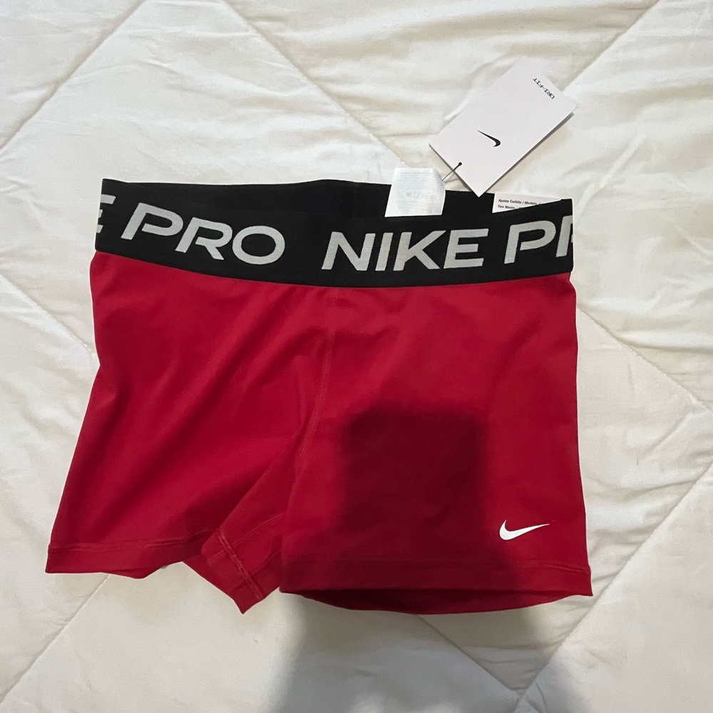 Red Nike spandex shorts